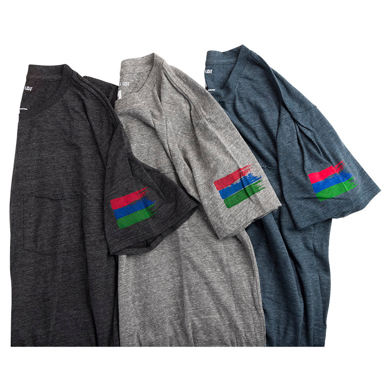 Product image of all three bucket list t-shirt options next to each other. The colors of the shirts include black, grey, and navy.