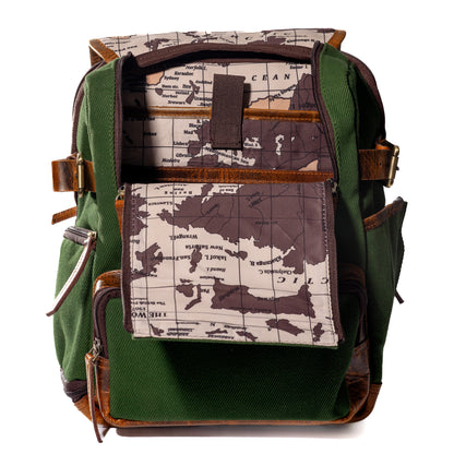 Product photo of a green canvas and leather backpack that is unzipped and showing the interior of the backpack. The inside has a world map design on the fabric.