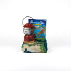 Red lantern, map, and 'The Bucket List Family and the Big Adventure' book on a white background