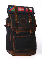 A black canvas backpack with leather accents