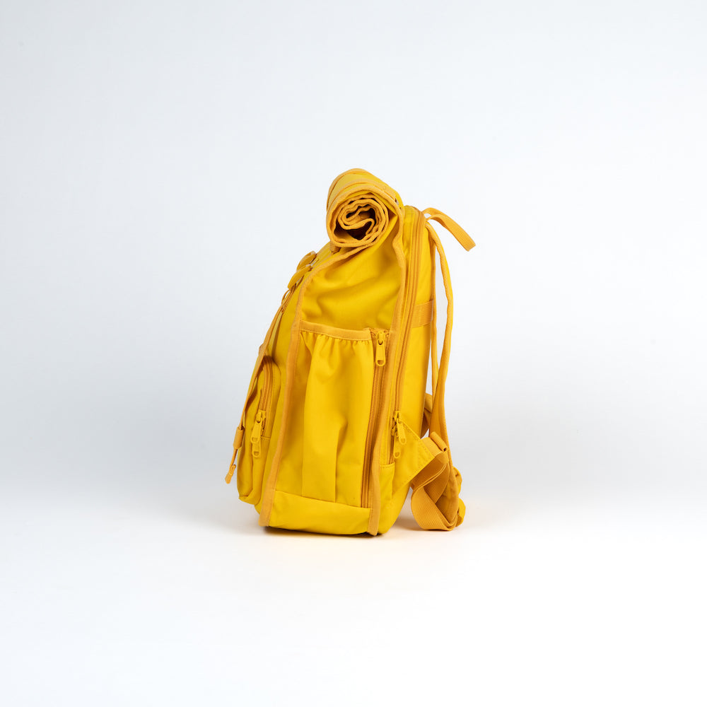 Yellow backpack on a white background