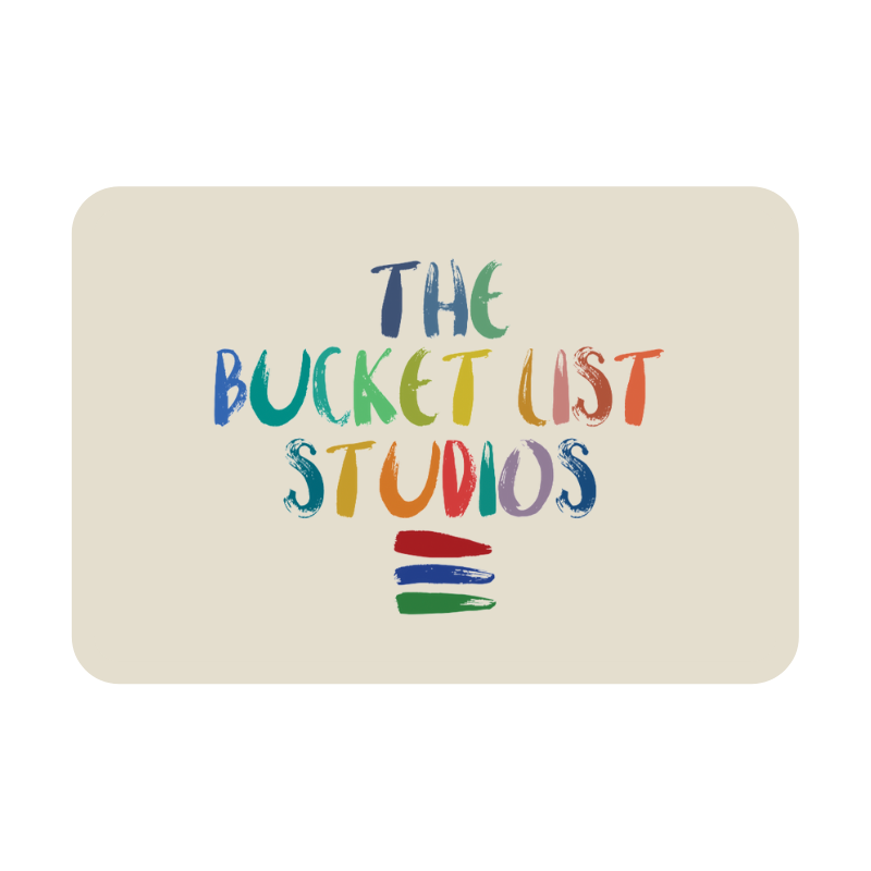 Image of a tan gift card with the bucket list studios written on it in colorful font.