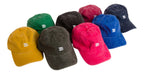 Group product photo of several baseball caps with the bucket list logo embroidered in white on the front of the caps.