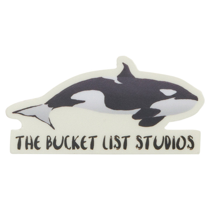 An image of a cartoon orca sticker that says The Bucket List Studios at the bottom. 